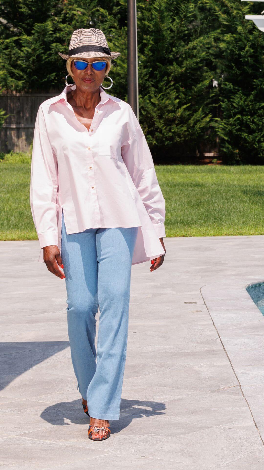 Women with Control® Elite Prime Stretch Denim Flare Pant in Stone Wash paired with the Attitudes By Renée® Flyaway Button Front Shirt in Pink Peony